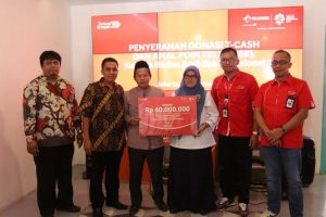 Telkomsel Gandeng BAZNAS Serahkan Donasi POIN Pelanggan